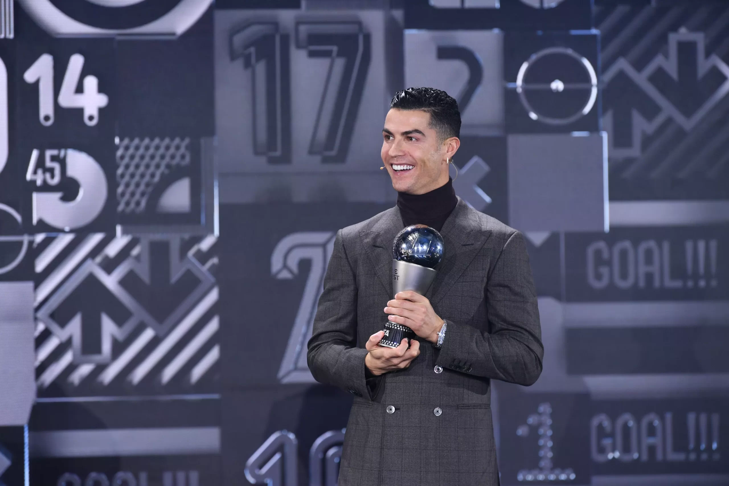 Cristiano Ronaldo taking FIFA award