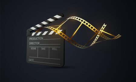film-clapperboard-with-curled-golden-filmstrip_305440-22